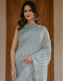 Elegant Ash Grey Handloom Mul Cotton Saree with Minimal Striped Weaving & Tassel Detailing