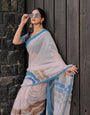 Ivory Mul Cotton Saree with Blue & Beige Striped Border, Statement Pallu & Tassels | Office Wear Saree, Comes With Attached Blouse Piece