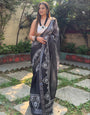Black and White Pure Cotton Linen Saree with Intricate Floral Design and Tassels on Edges