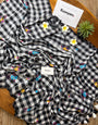 Black & White Checkered Mul Cotton Saree with Multicolour Floral Motifs, Tassels & Blouse Piece