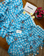 Sky Blue & White Checkered Mul Cotton Saree with Multicolour Floral Motifs, Tassels & Blouse Piece