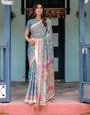Aqua Blue Handloom Cotton Saree with Multicolor Floral Print & Royal Simha-Pakshi Pallu