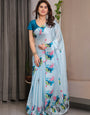 Sky Blue Satin Georgette Lotus & Crane Printed Saree with Attached Blouse ā Serene Nature-Inspired Designer Drape