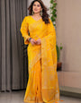 Mustard Yellow Fendi Satin Floral Block & Foil Printed Saree with Ornamental Border, Tassel Edges & Attached Blouse