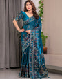 Peacock Teal Blue Fendi Satin Peacock & Floral Block and Foil Printed Saree with Traditional Border, Tassel Edges & Attached Blouse