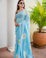 Sky Blue Mul Cotton Saree with Daisy Floral Print & Blue-White Tasselled Pallu