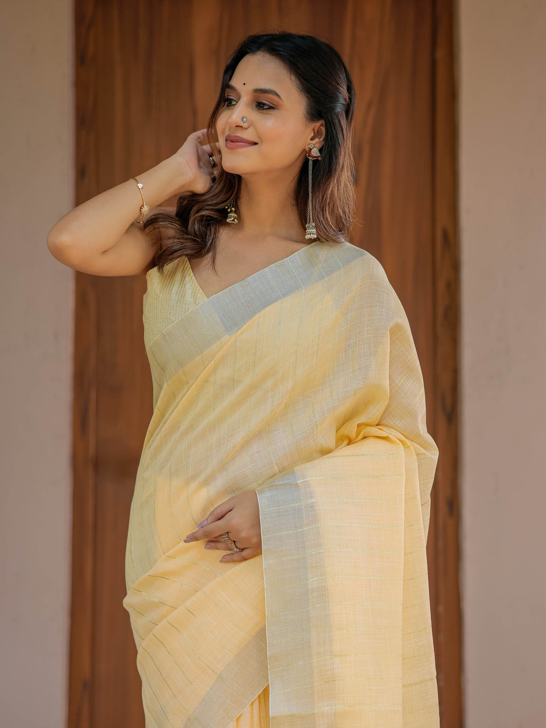 Butter Yellow Pure Handloom Cotton Saree with Golden Striped Weaving & Tassel Detailing