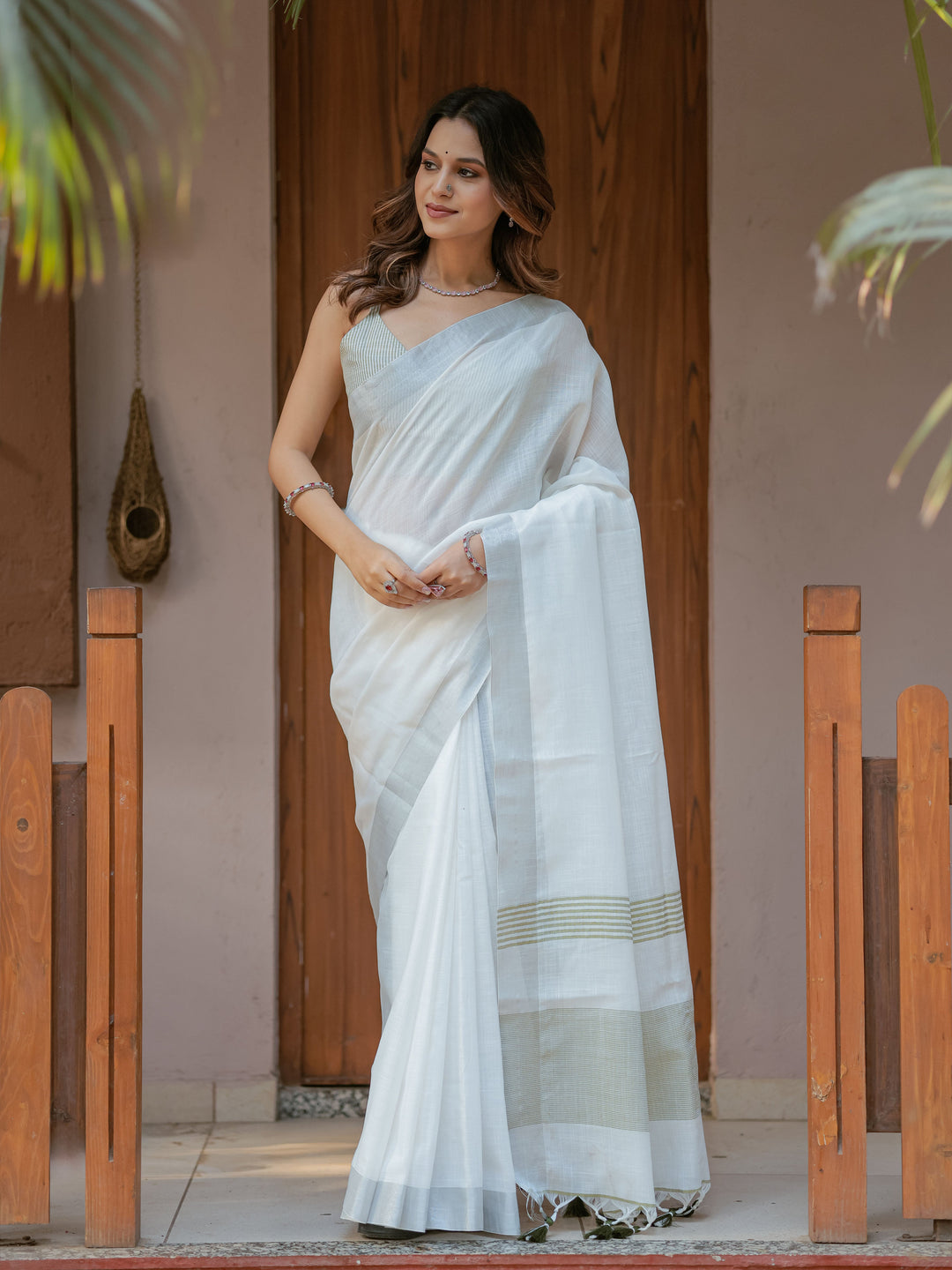 Pure White & Olive Green Handloom Cotton Saree with Minimal Striped Border & Tassel Detailing