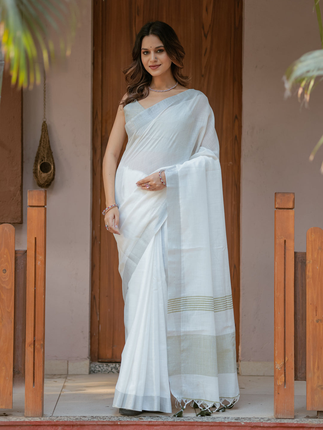 Pure White & Olive Green Handloom Cotton Saree with Minimal Striped Border & Tassel Detailing