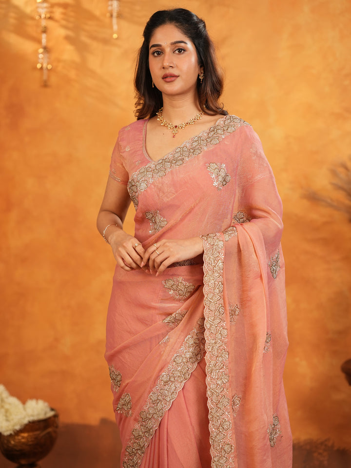 Peach Pink Fendy Satin Embroidered Saree with Rich Floral Border & Tassels | Elegant Pastel Designer Saree with Heavy Embroidered Blouse