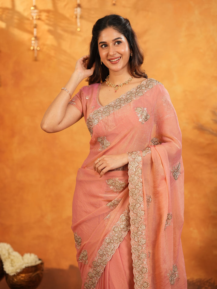 Peach Pink Fendy Satin Embroidered Saree with Rich Floral Border & Tassels | Elegant Pastel Designer Saree with Heavy Embroidered Blouse