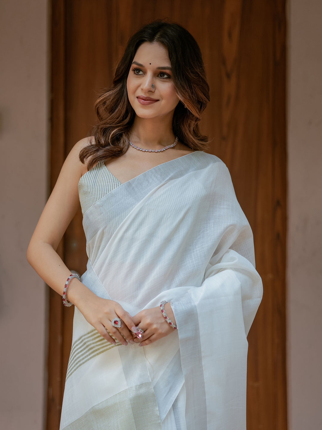 Pure White & Olive Green Handloom Cotton Saree with Minimal Striped Border & Tassel Detailing