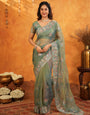 Teal Green Fendy Satin Embroidered Saree with Multicolor Floral Border & Tassels | Premium Designer Saree with Heavy Embroidered Blouse