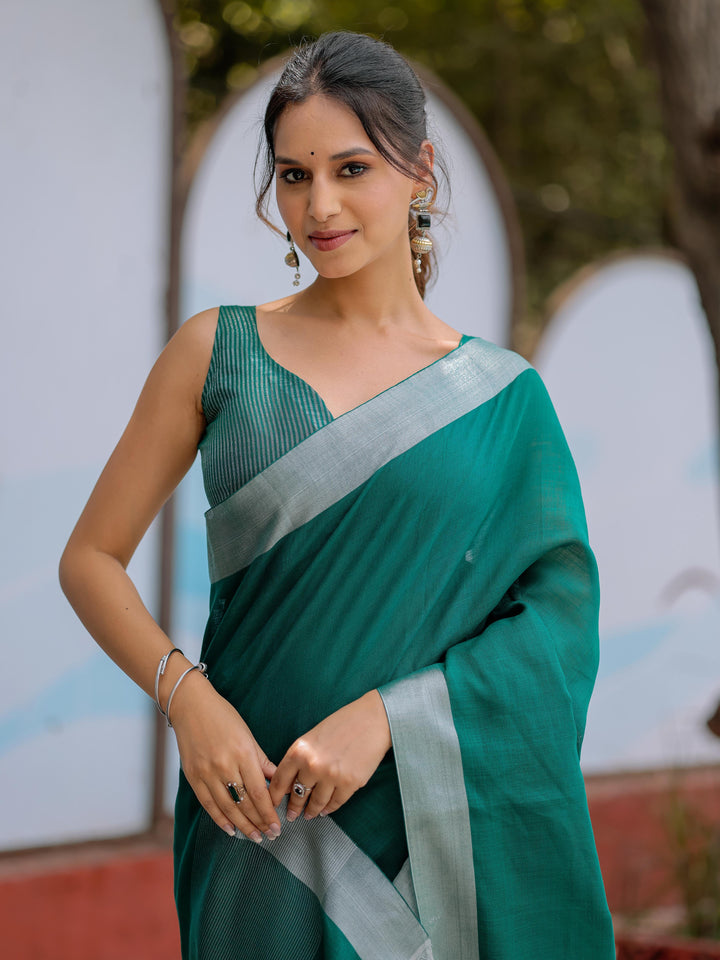 Elegant Emerald Green Pure Handloom Cotton Saree with Silver Border & Tassel Detailing