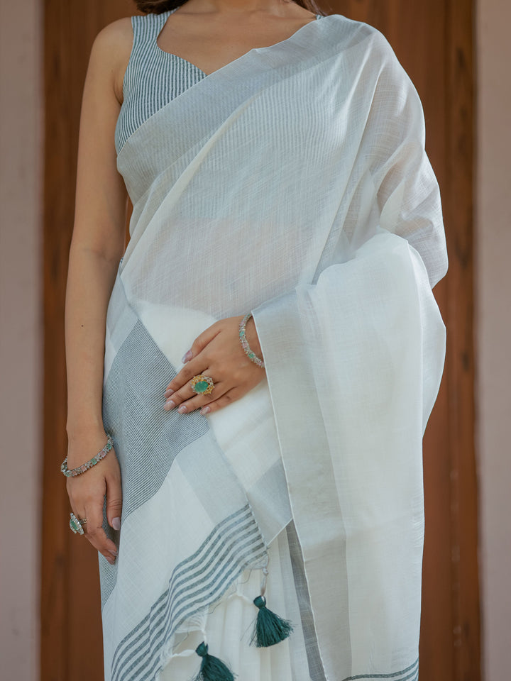 Pure White & Teal Blue Handloom Cotton Saree with Minimal Striped Border & Tassel Detailing