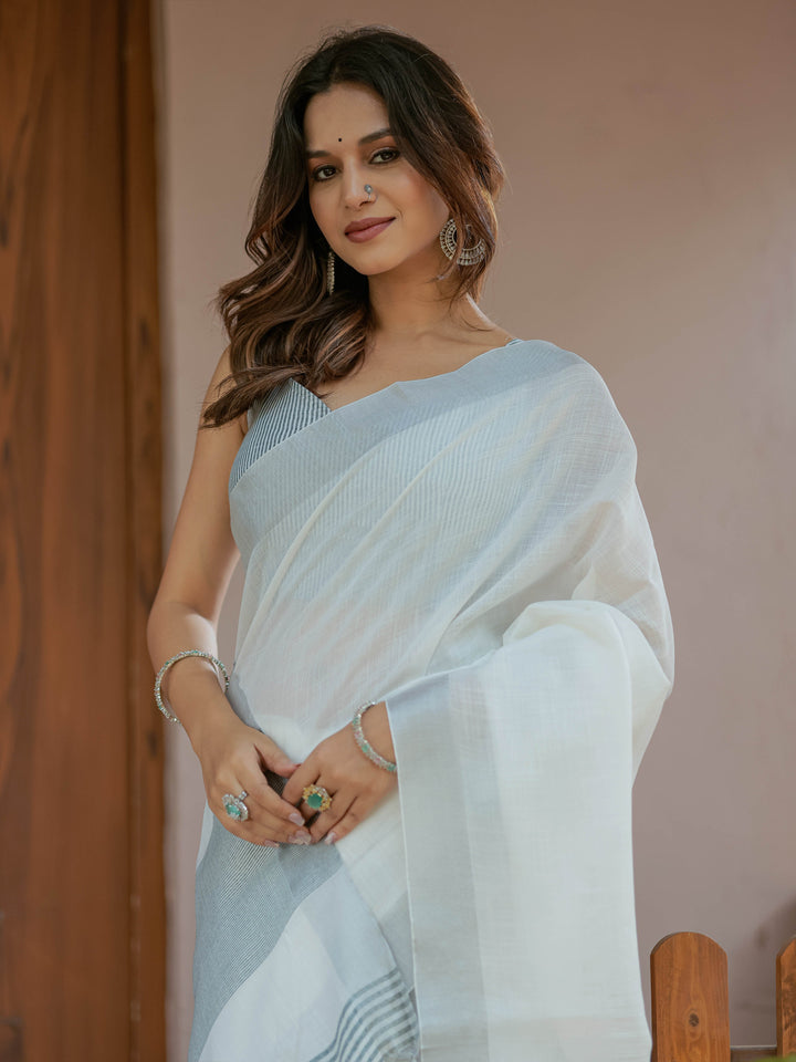 Pure White & Teal Blue Handloom Cotton Saree with Minimal Striped Border & Tassel Detailing