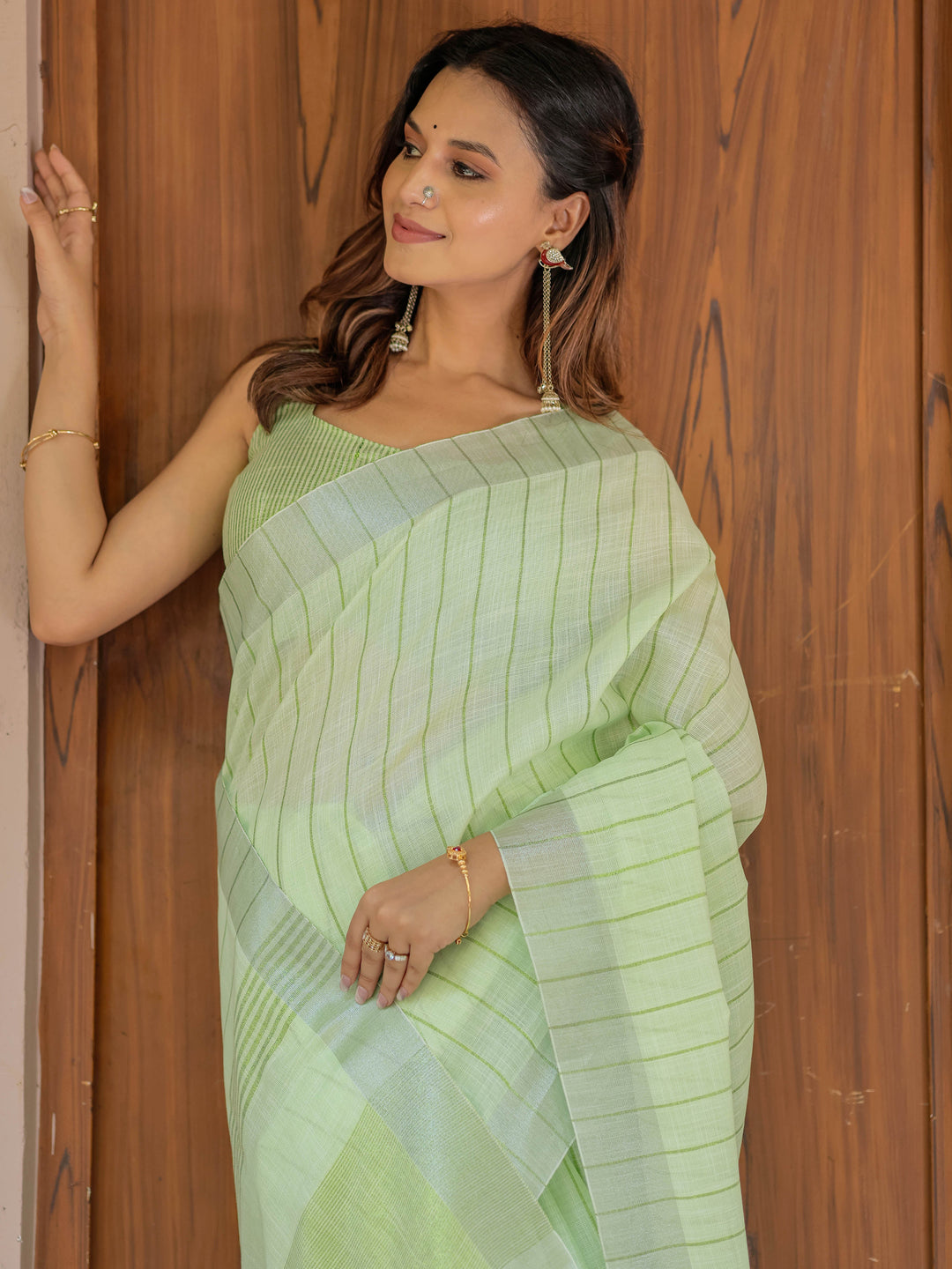 Mint Green Pure Handloom Cotton Saree with Striped Weaving & Tassel Detailing