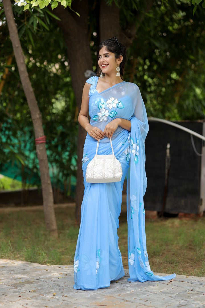 Sky Blue Chiffon Saree with Hand-Painted White Floral Design | Lightweight Designer Saree with Blouse Piece