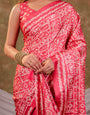 Coral Pink Pure Chinnon Batik Printed Saree with Foil Detailing, Designer Border, Tassel Edges & Matching Blouse Piece