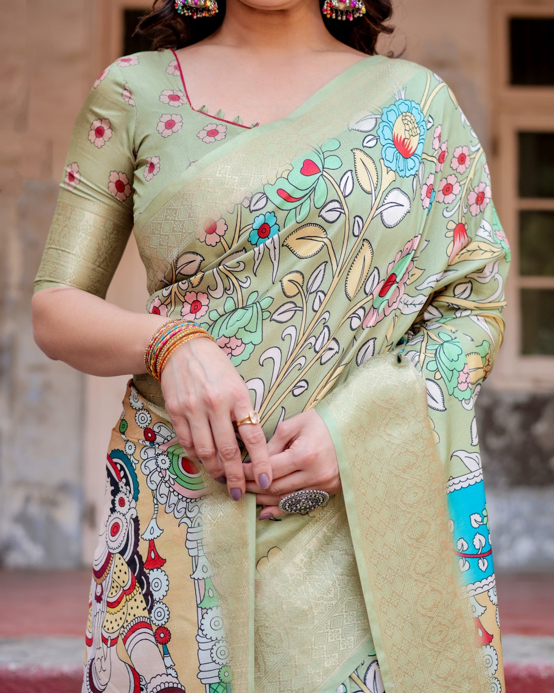 Sage Green Tussar Silk Saree with Kalamkari Floral Print, Zari Border, Radha Krishna Pallu & Tassels