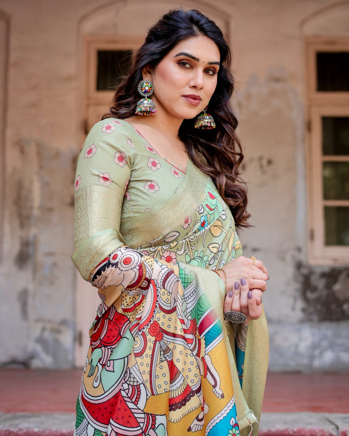 Sage Green Tussar Silk Saree with Kalamkari Floral Print, Zari Border, Radha Krishna Pallu & Tassels
