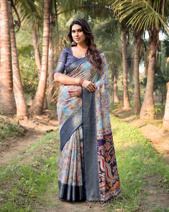 Powder Blue Tussar Silk Saree with Floral Kalamkari Print, Woven Border, Tassels & Attached Blouse