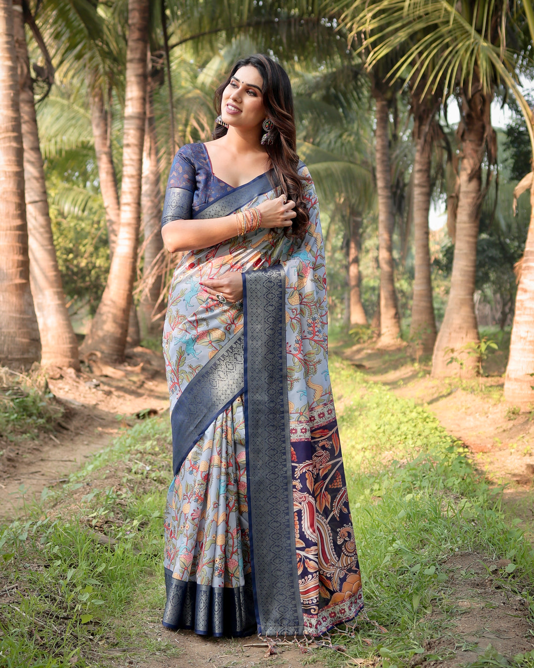 Powder Blue Tussar Silk Saree with Floral Kalamkari Print, Woven Border, Tassels & Attached Blouse