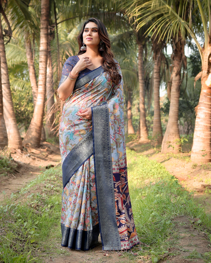 Powder Blue Tussar Silk Saree with Floral Kalamkari Print, Woven Border, Tassels & Attached Blouse