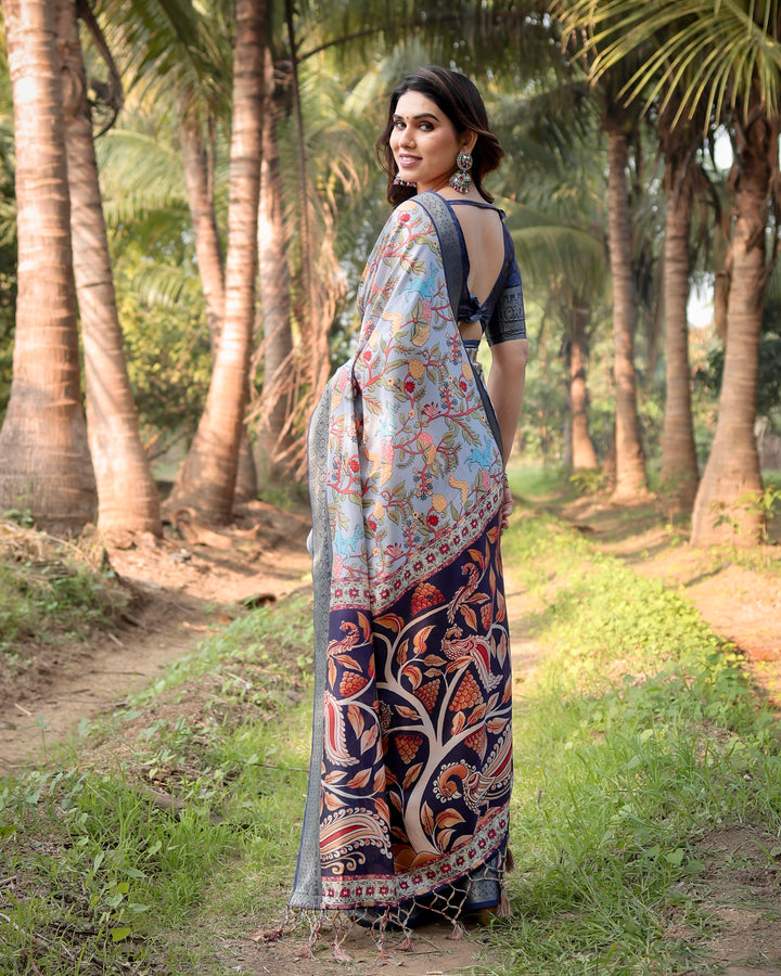 Powder Blue Tussar Silk Saree with Floral Kalamkari Print, Woven Border, Tassels & Attached Blouse