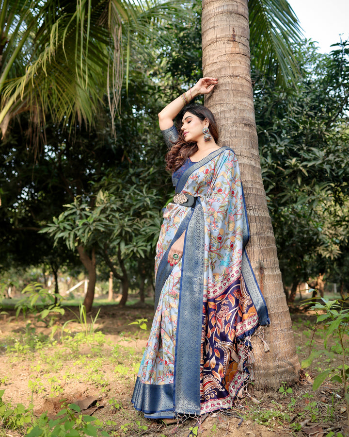 Powder Blue Tussar Silk Saree with Floral Kalamkari Print, Woven Border, Tassels & Attached Blouse