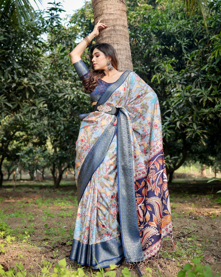 Powder Blue Tussar Silk Saree with Floral Kalamkari Print, Woven Border, Tassels & Attached Blouse