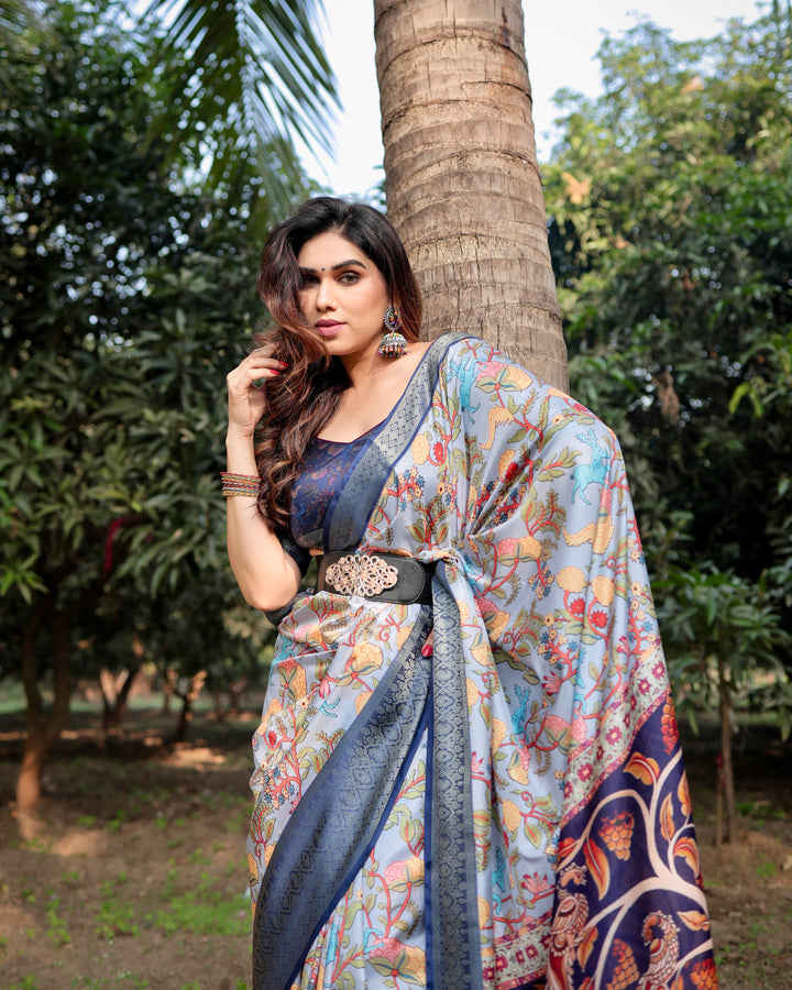 Powder Blue Tussar Silk Saree with Floral Kalamkari Print, Woven Border, Tassels & Attached Blouse