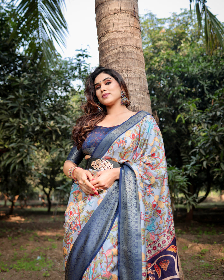 Powder Blue Tussar Silk Saree with Floral Kalamkari Print, Woven Border, Tassels & Attached Blouse