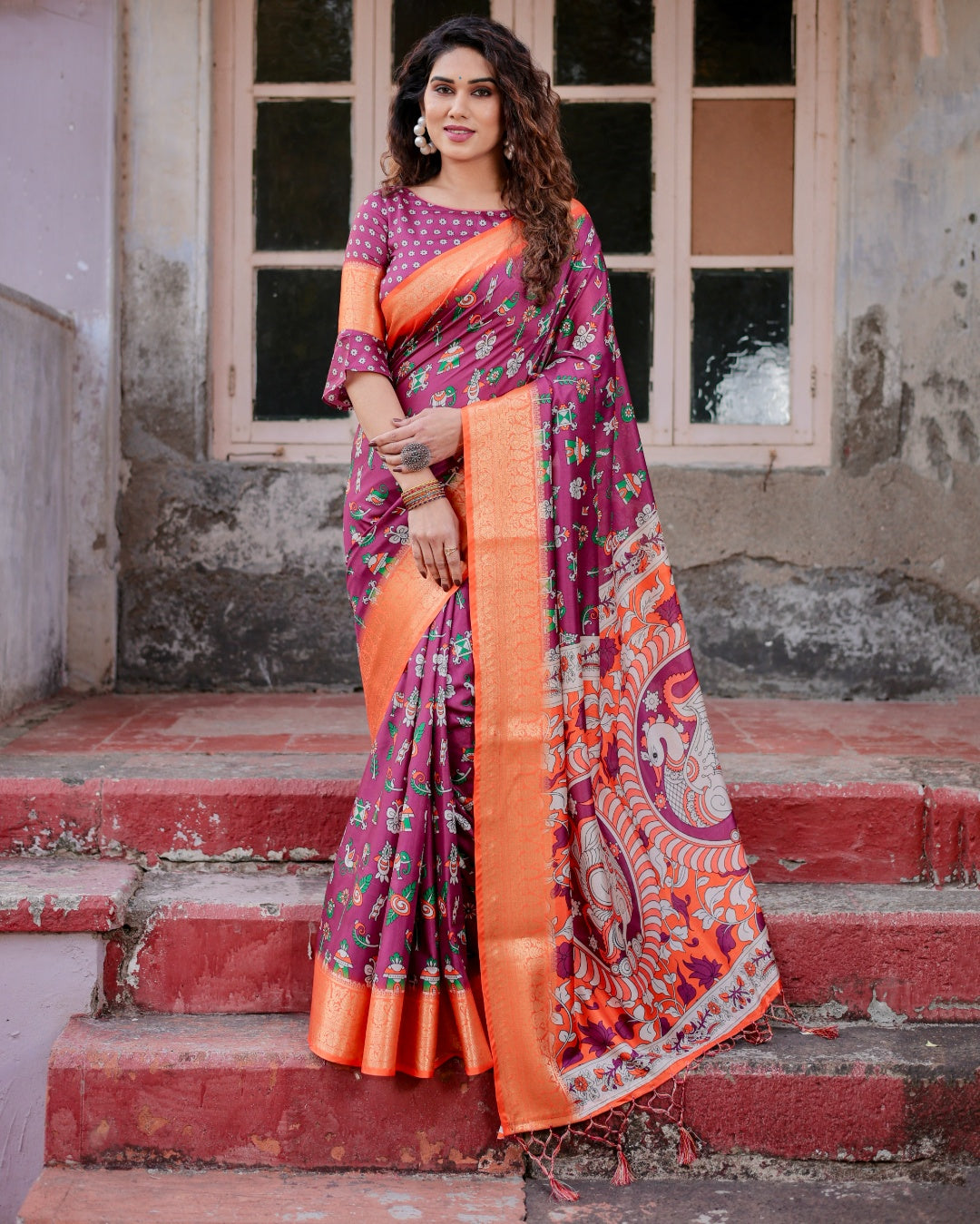 Wine Tussar Silk Saree with Multicolor Folk Print, Orange Zari Border, Peacock Pallu & Tassels
