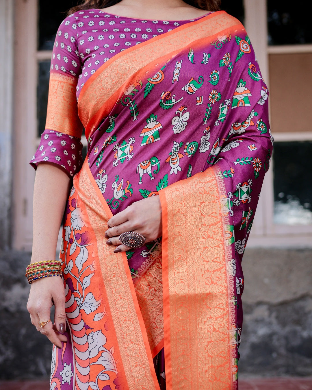 Wine Tussar Silk Saree with Multicolor Folk Print, Orange Zari Border, Peacock Pallu & Tassels