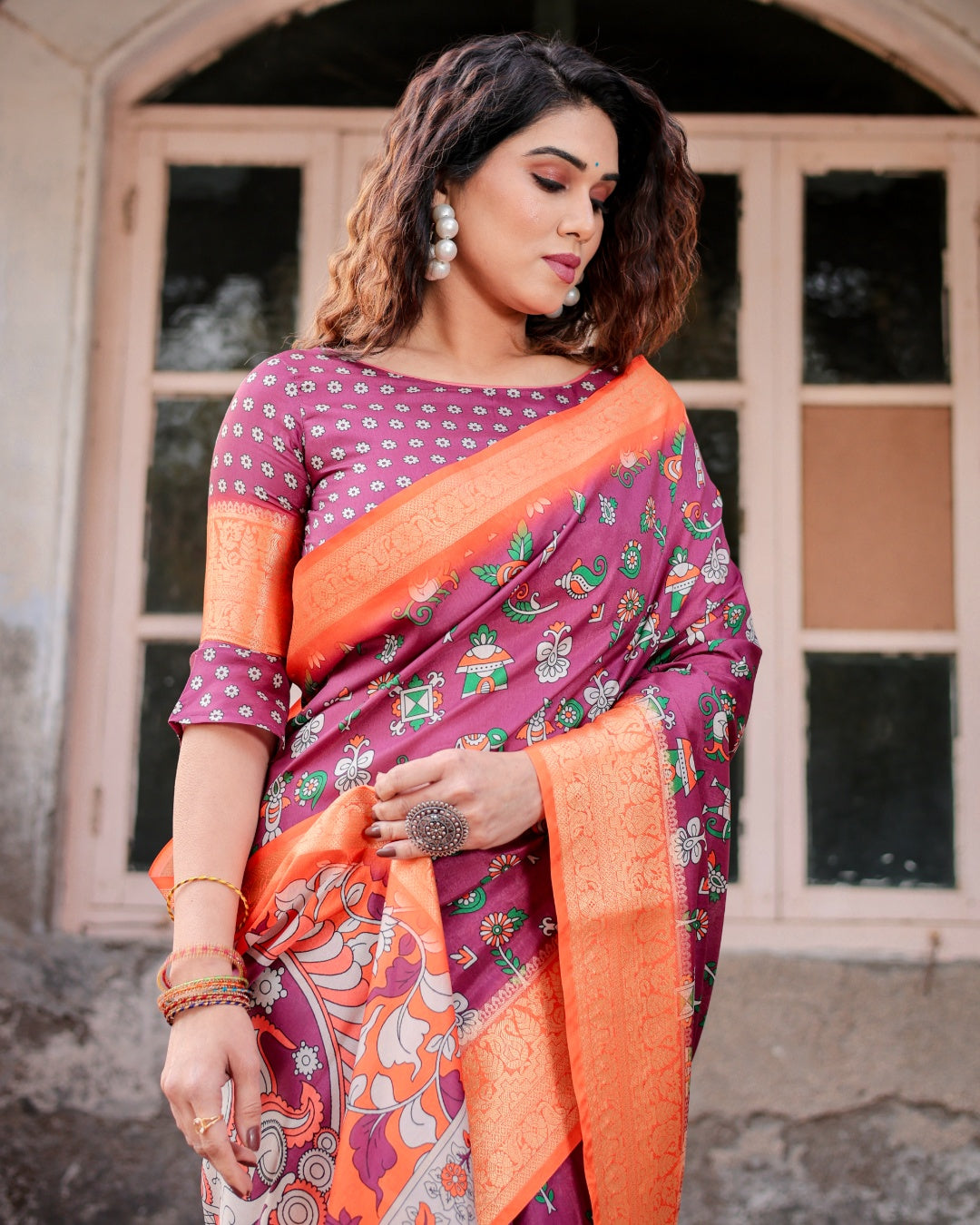 Wine Tussar Silk Saree with Multicolor Folk Print, Orange Zari Border, Peacock Pallu & Tassels