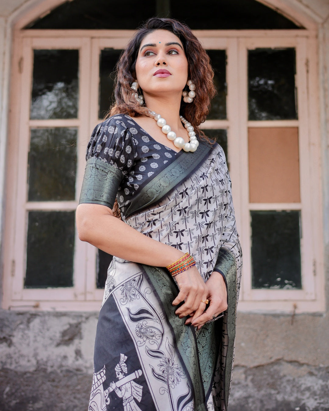 Ivory & Black Tussar Silk Saree with Dragonfly Print, Antique Zari Border, Artistic Pallu & Tassels