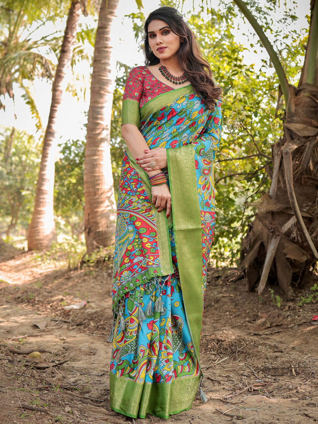 Turquoise Blue Tussar Silk Saree with Kalamkari Peacock Print, Green Woven Border, Tassels & Attached Blouse