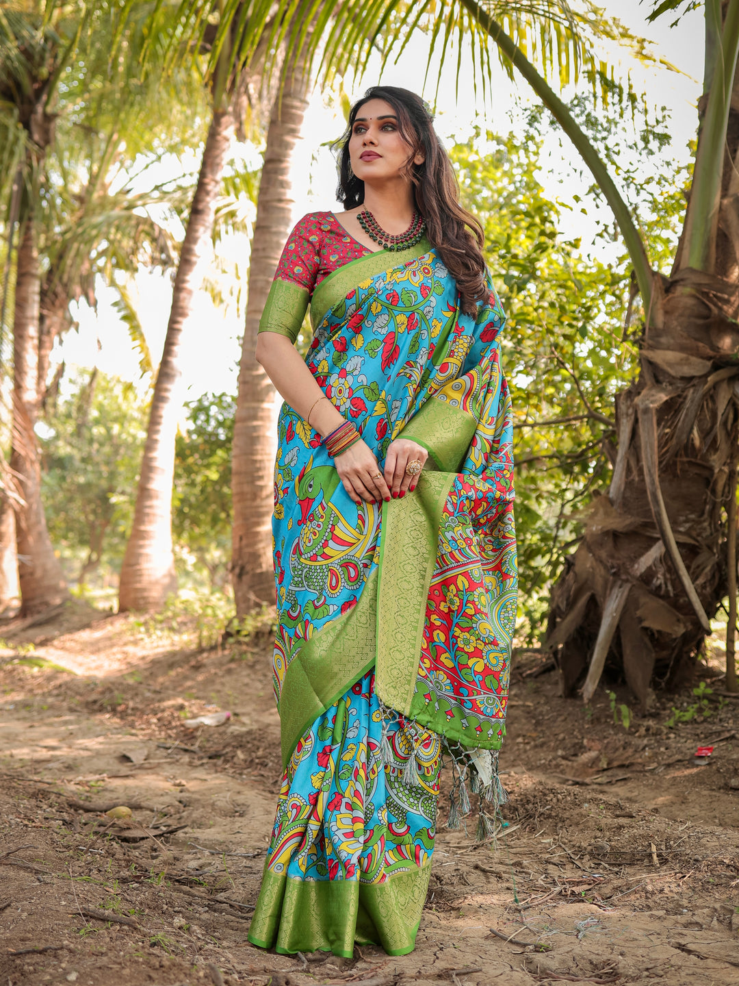 Turquoise Blue Tussar Silk Saree with Kalamkari Peacock Print, Green Woven Border, Tassels & Attached Blouse