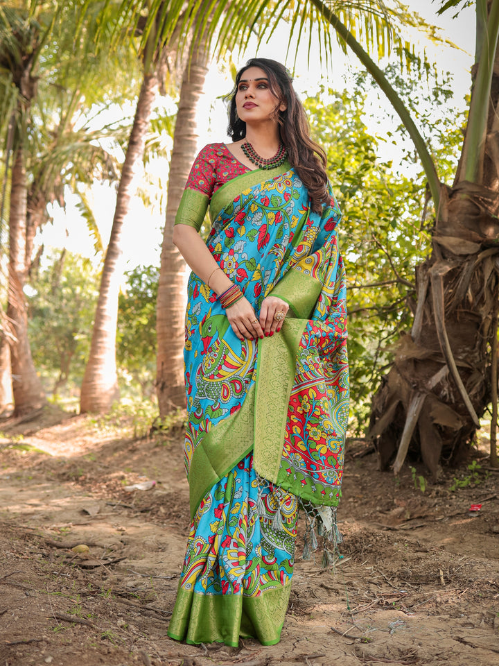 Turquoise Blue Tussar Silk Saree with Kalamkari Peacock Print, Green Woven Border, Tassels & Attached Blouse
