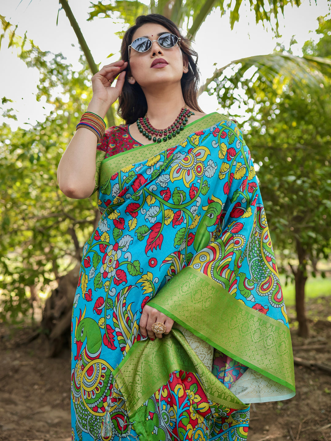 Turquoise Blue Tussar Silk Saree with Kalamkari Peacock Print, Green Woven Border, Tassels & Attached Blouse