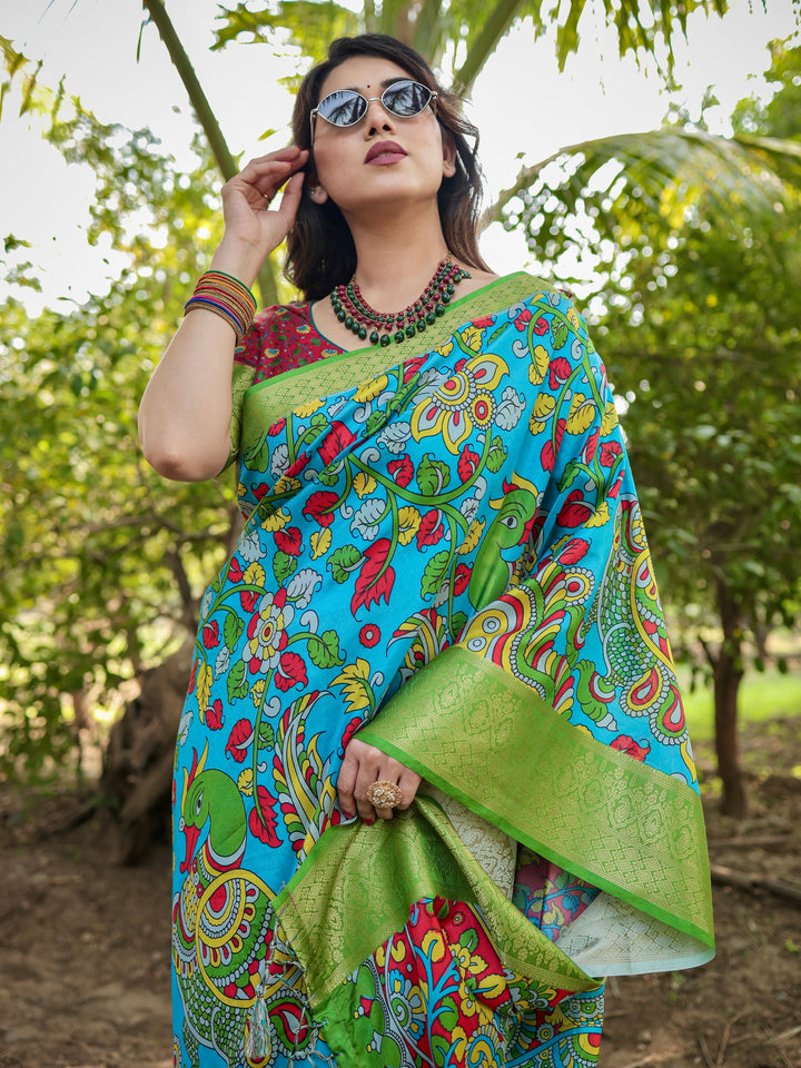 Turquoise Blue Tussar Silk Saree with Kalamkari Peacock Print, Green Woven Border, Tassels & Attached Blouse