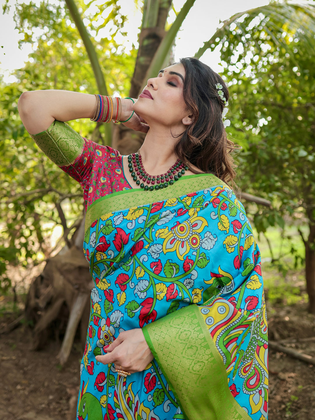 Turquoise Blue Tussar Silk Saree with Kalamkari Peacock Print, Green Woven Border, Tassels & Attached Blouse
