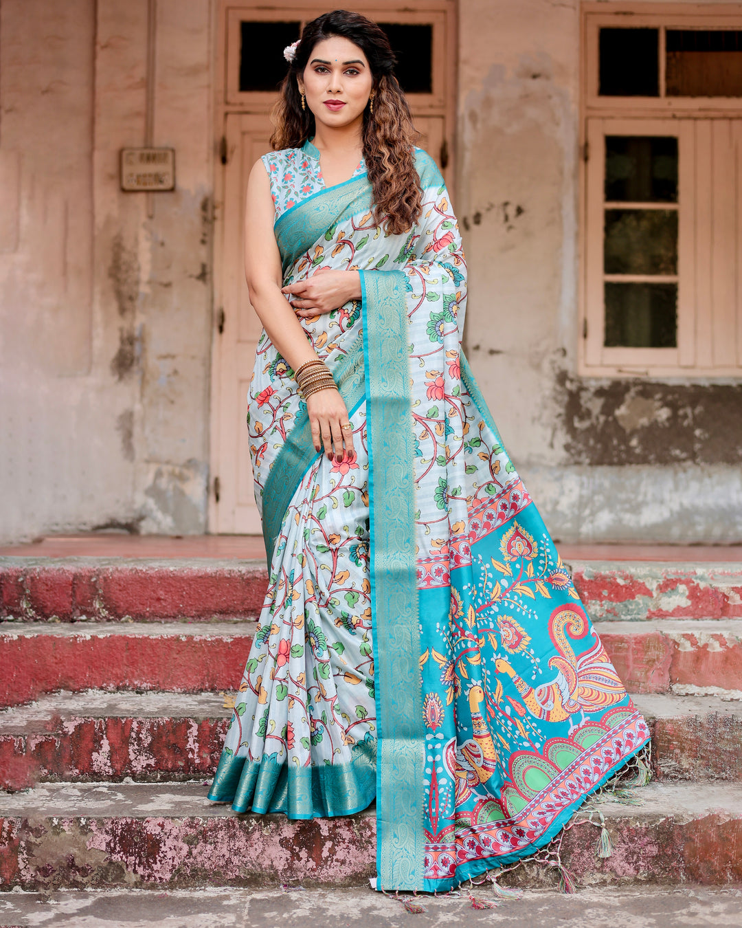 Ice Blue Tussar Silk Saree with Kalamkari Floral Print, Turquoise Woven Border, Peacock Pallu, Tassels & Attached Blouse