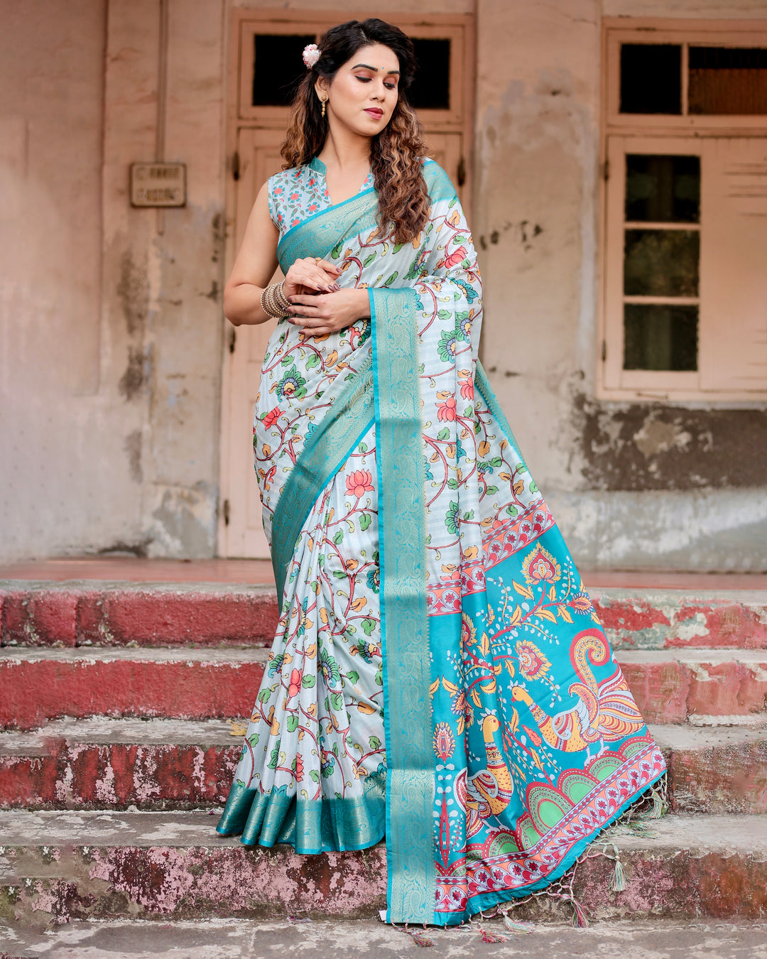 Ice Blue Tussar Silk Saree with Kalamkari Floral Print, Turquoise Woven Border, Peacock Pallu, Tassels & Attached Blouse