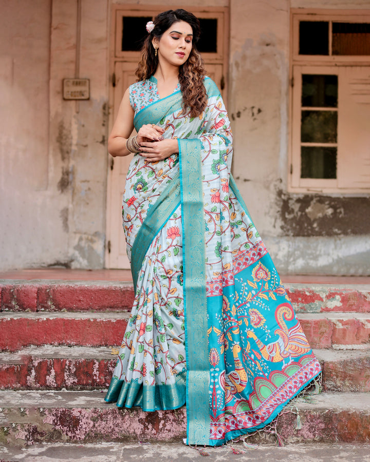 Ice Blue Tussar Silk Saree with Kalamkari Floral Print, Turquoise Woven Border, Peacock Pallu, Tassels & Attached Blouse