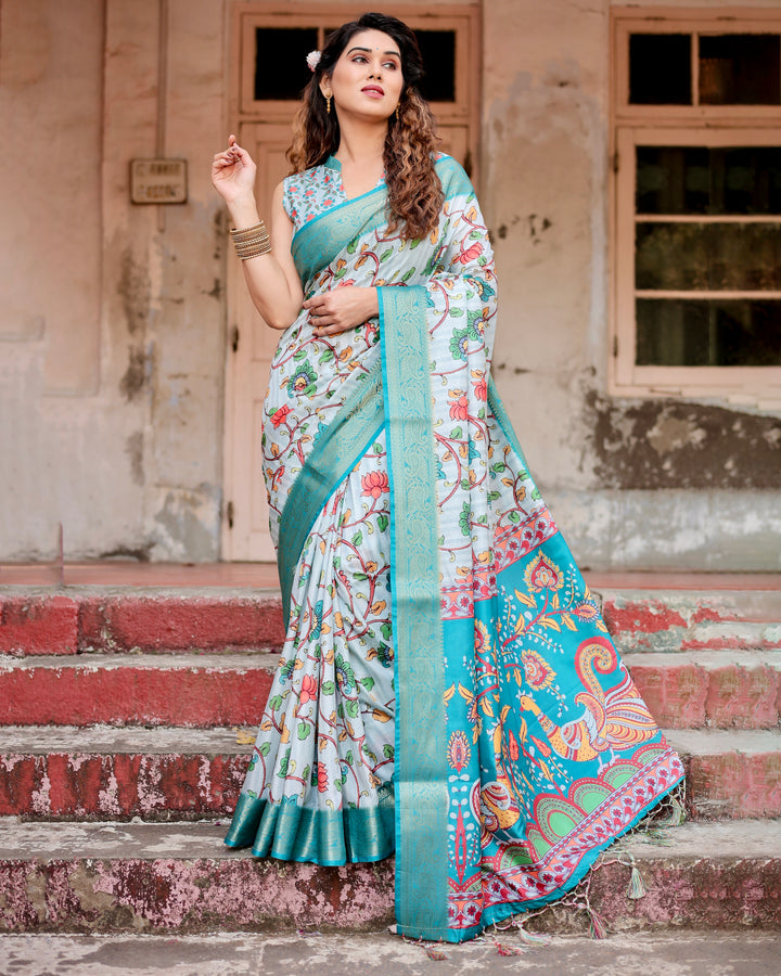 Ice Blue Tussar Silk Saree with Kalamkari Floral Print, Turquoise Woven Border, Peacock Pallu, Tassels & Attached Blouse