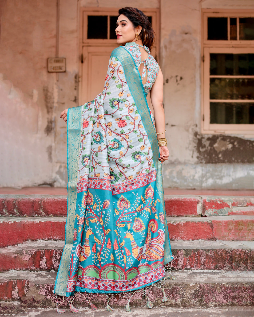 Ice Blue Tussar Silk Saree with Kalamkari Floral Print, Turquoise Woven Border, Peacock Pallu, Tassels & Attached Blouse