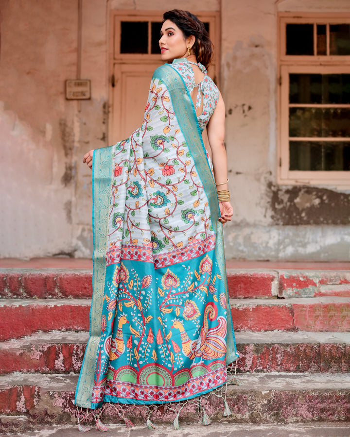 Ice Blue Tussar Silk Saree with Kalamkari Floral Print, Turquoise Woven Border, Peacock Pallu, Tassels & Attached Blouse