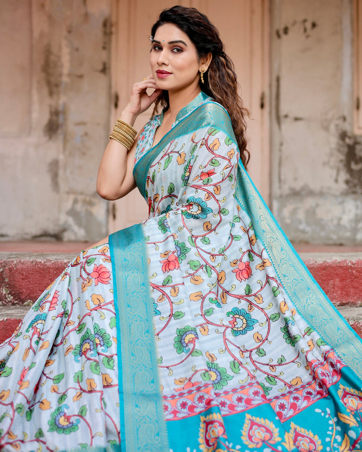 Ice Blue Tussar Silk Saree with Kalamkari Floral Print, Turquoise Woven Border, Peacock Pallu, Tassels & Attached Blouse